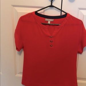 Bright orange blouse